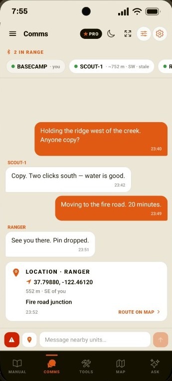 Comms screen with BASECAMP, SCOUT-1, and RANGER. Two-sided mesh chat and a RANGER location pin for the fire road junction.